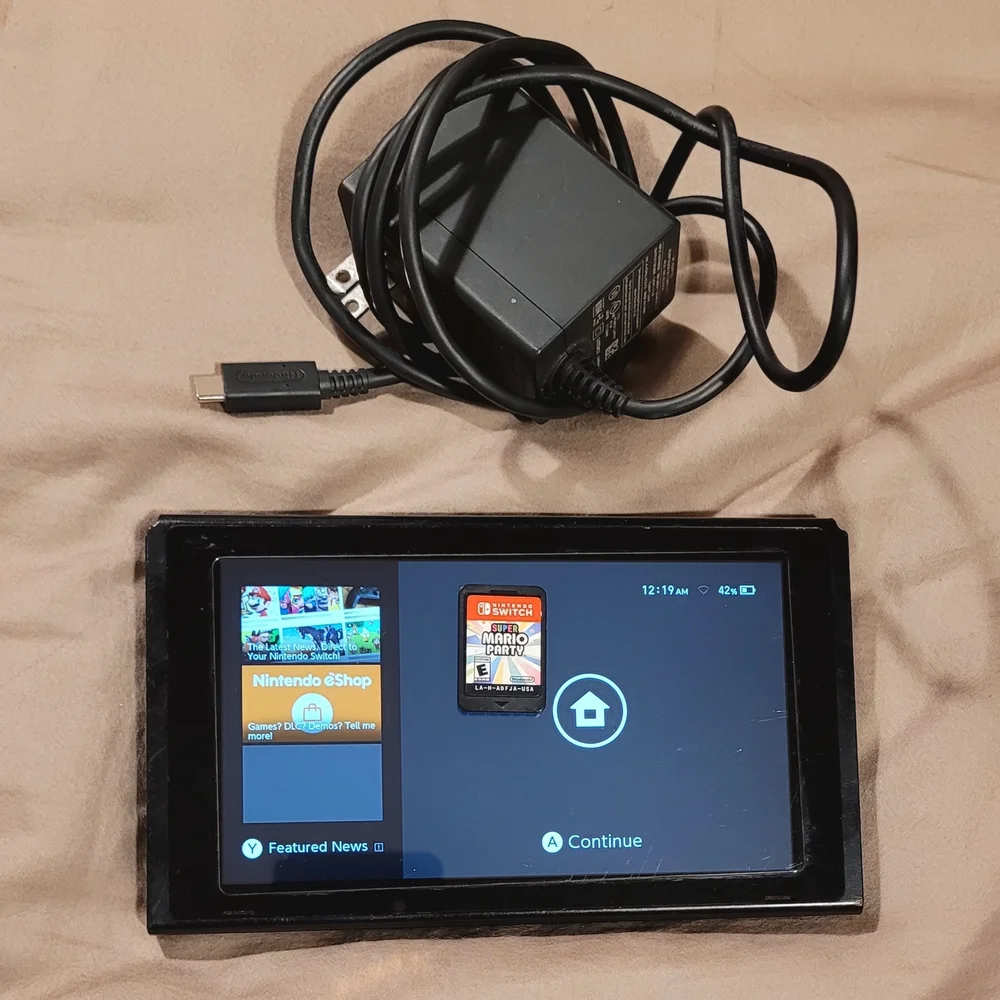 Nintendo Switch Console - Black with Charger And Mario Party Game